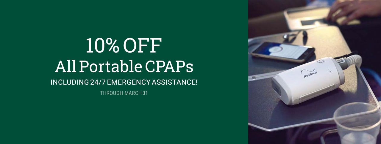 marketing image for 10% OFF all Portable CPAPs through March 31, 2025 with white text on a green background on the left and an image of a ResMed mini portable CPAP resting on part of an airplane tray table, with a mobile phone and ear buds visible in the receding background where sunlight shines in background of the image